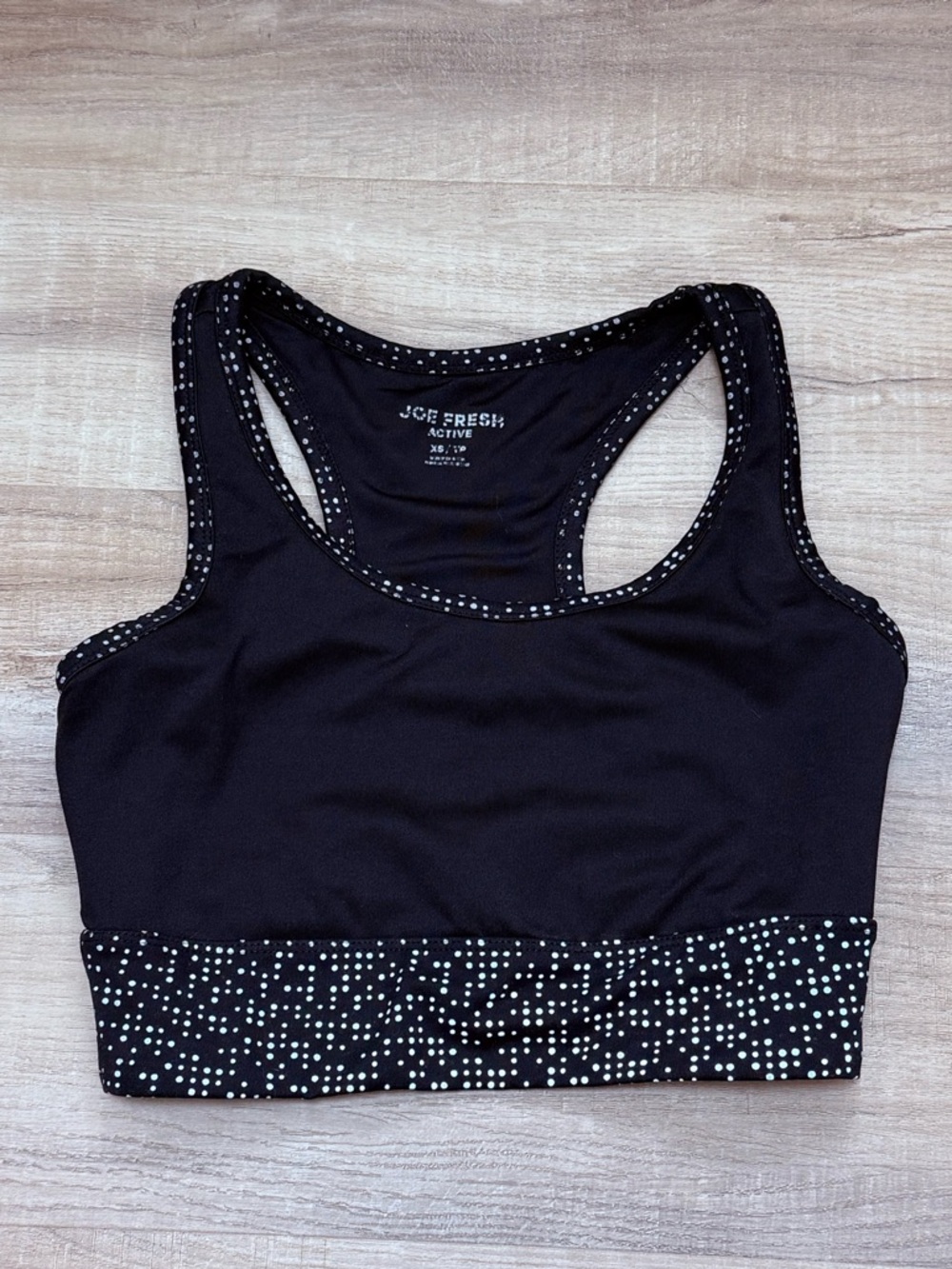 Black with reflective polkadots workout sports bra